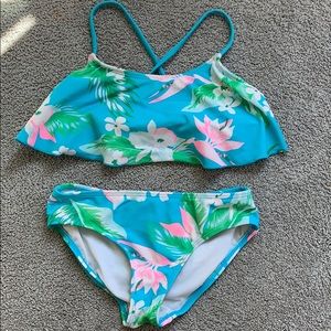 A blue with flower bsuit!! This has been used!